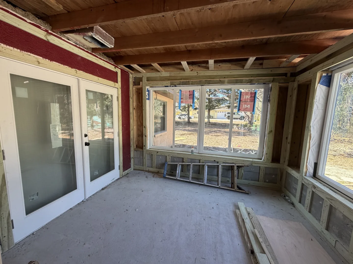 Commercial concrete floor installation by licensed contractor with power trowel